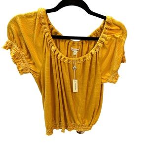 Boho style top. Off shoulder or on shoulder. Golden yellow color. Size is S